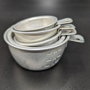 Vintage Aluminum Measuring Cups group of 6 - V2540