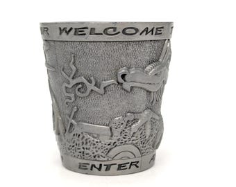 Vintage "Welcome To The Dragon's Lair" metal over glass Dungeons and Dragons style Shot Glass - V6268
