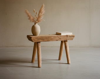 Tijdloze kruk van gerecycled hout met karakter.
