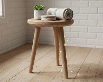 Walden Stool - minimalist three-legged wooden stool, handcrafted from solid wood, for sitting or as a side table for decoration