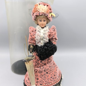 Vintage doll collection Laurette 60s, french plastic doll in 19th century outfit, doll in pink outfit with umbrella, French regional doll