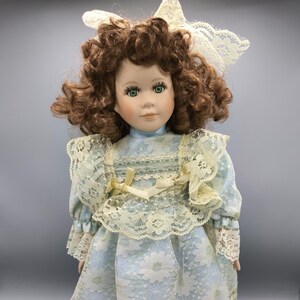 Vintage porcelain doll in dress with lace, pretty doll with green eyes and curly brown hair, collecting, gift for girl, vintage doll lover