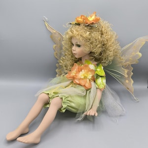 Vintage porcelain elf doll, cute elf girl with wings, forest fairy doll, sitting elf doll collection, stunning and rare collectors gift