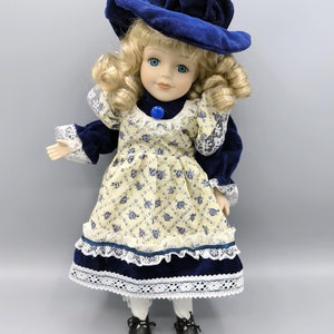 Vintage porcelain wind up doll in retro outfit, movable blonde doll in white blue dress and hat, dancing doll, Christmas or collector gift