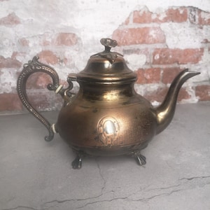 Vintage early 20th century teapot/coffee pot with flower on the lid and twisted legs, stunning decoration of the dining room, kitchen