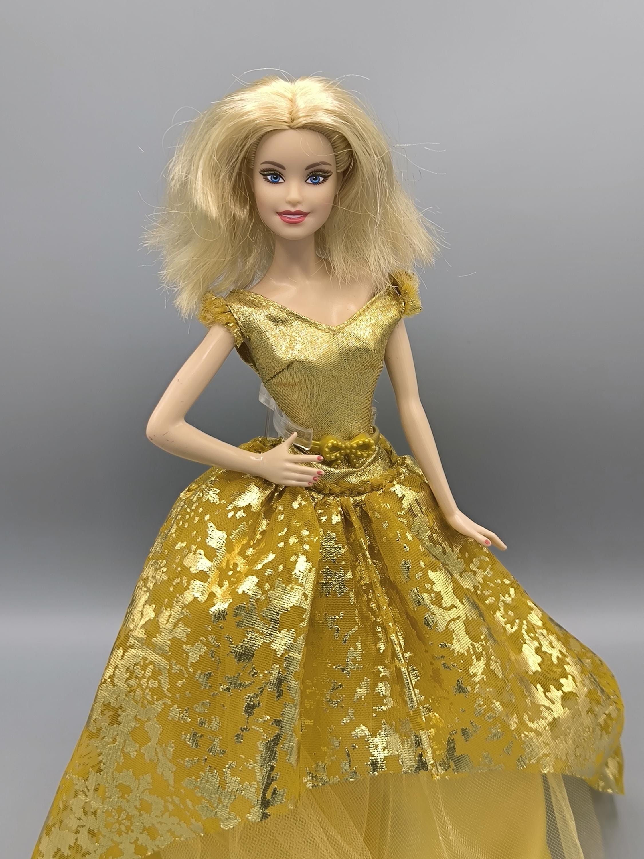 barbie the look gold dress doll 2020 Holiday gold barbie logo
