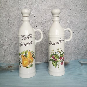 Vintage porcelain bottles with cork, with handle, Revol, France, pear and raspberry pattern