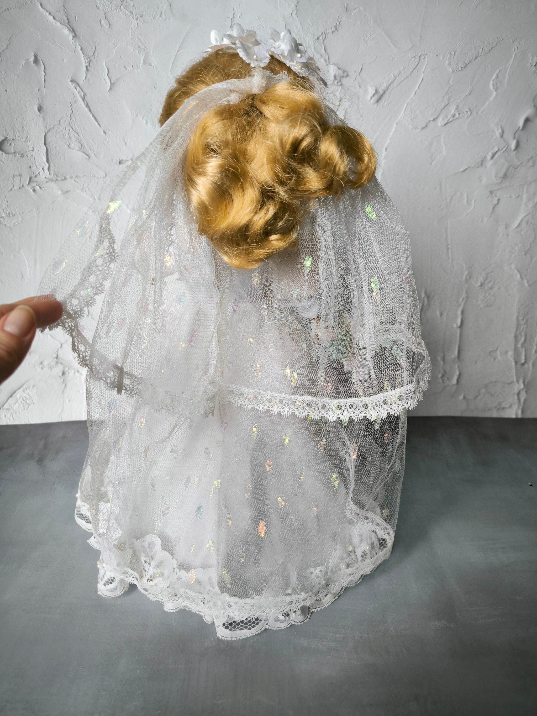 Poupées en porcelaine, les robes roses