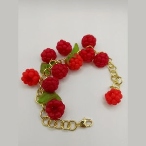 Red raspberry bracelet with green leaves