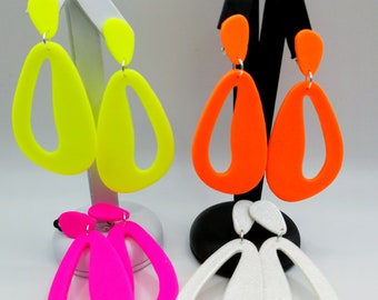Neon pink, yellow, orange, green, and white ear clips; teardrop-shaped, large summer ear clips in neon.