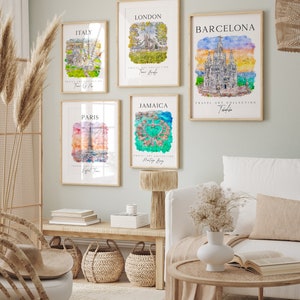 May include: Five watercolor paintings of different cities around the world. Each painting features a landmark building or structure, such as the Eiffel Tower in Paris, Big Ben in London, and the Sagrada Familia in Barcelona. The paintings are framed in light wood and are displayed on a white wall.