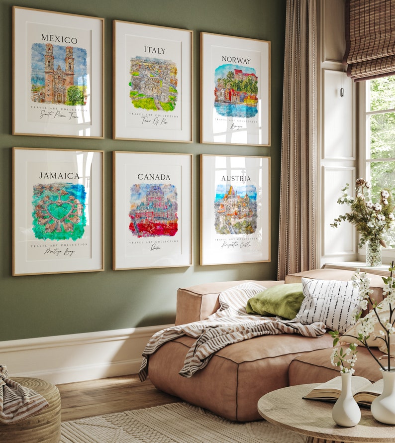 May include: Six framed watercolor paintings of different cities around the world. Each painting features a cityscape with a watercolor wash background. The cities are Mexico, Italy, Norway, Jamaica, Canada, and Austria.