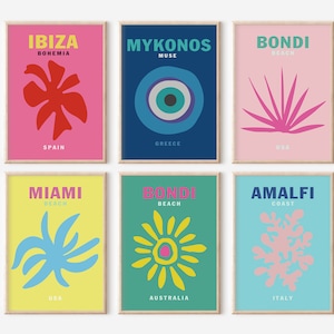 May include: Six colorful posters with a graphic design of a stylized symbol and text. The posters are titled "Ibiza Bohemia", "Mykonos Muse", "Bondi Beach", "Miami Beach", "Bondi Beach", and "Amalfi Coast".