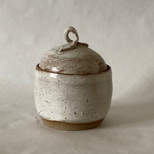 Wheel thrown clay lidded  salt container in white speckle glaze