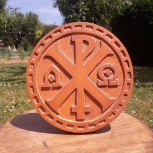 Chrism, ancient Christian symbol, stone sculpture