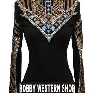 May include: A black long-sleeved bodysuit featuring a high collar and intricate geometric embellishments in gold, silver, and iridescent crystals across the chest and sleeves. The text BOBBY WESTERN SHOP is printed in white across the lower section.