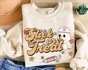 Stick or Treat Halloween Nurse Sweater, Spooky Nurse Sweatshirt, Nurse Halloween Gifts, Halloween Party Shirt, Nurse Halloween Crewneck