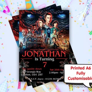May include: A red and black invitation with a Stranger Things theme. The invitation says "Jonathan is turning 7" and includes details about the party, including the date, time, and location. The invitation also includes a printed A6 fully customisable option.