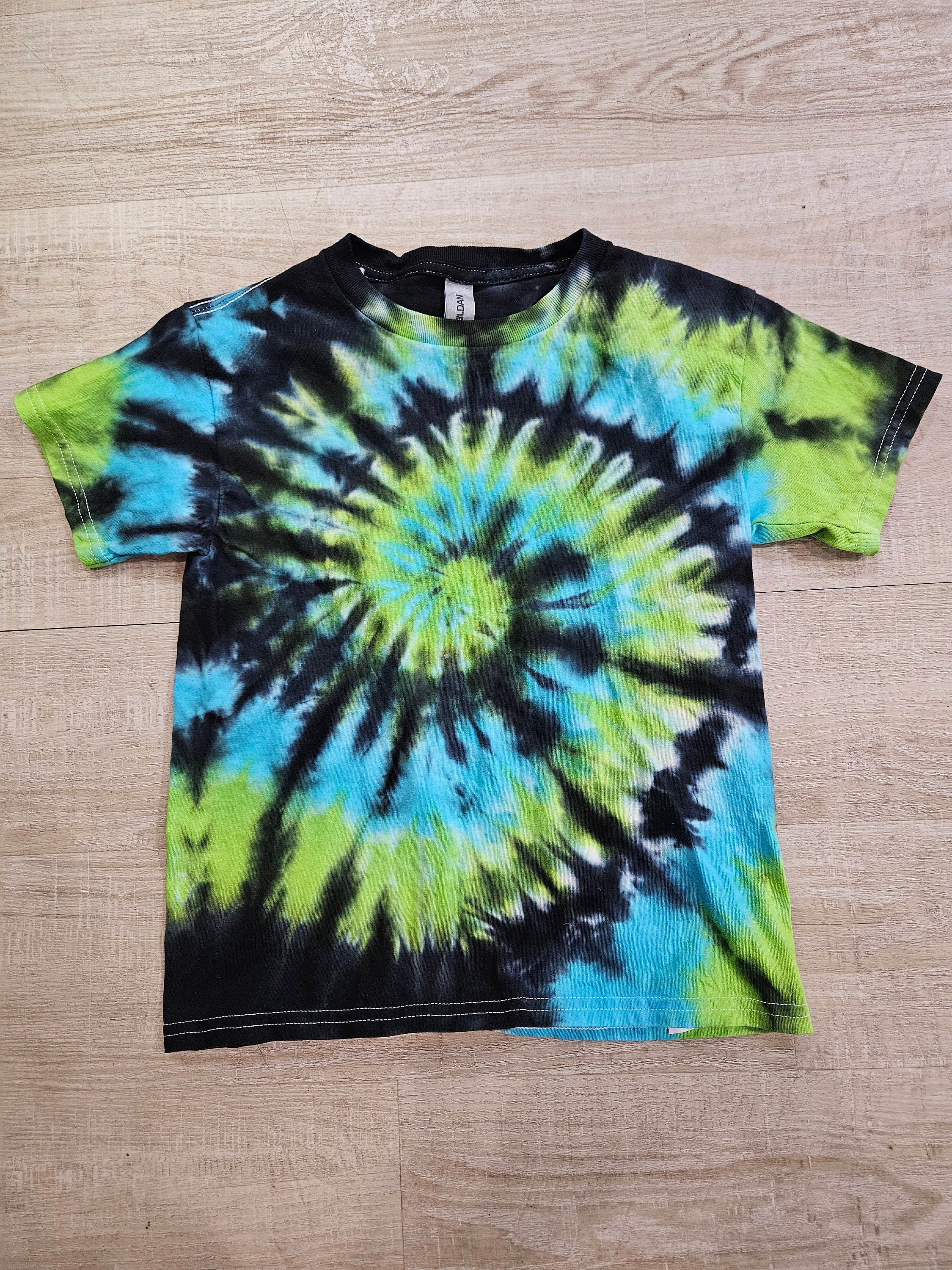 black and green tie dye shirt