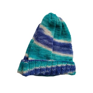 Set consisting of hand cuffs and cap, knitted