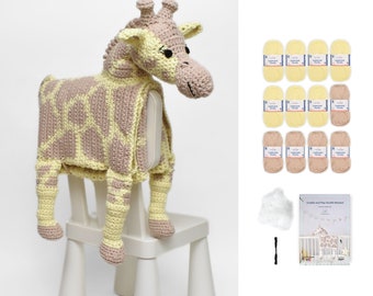 May include: A crochet giraffe cuddle and play blanket kit. The kit includes yarn in yellow and brown, stuffing, a crochet hook, and instructions. The finished product is a soft and cuddly giraffe blanket that is perfect for babies and toddlers.