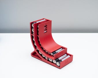 Battery Dispenser: Holds 12 AA and 12 AAA Batteries