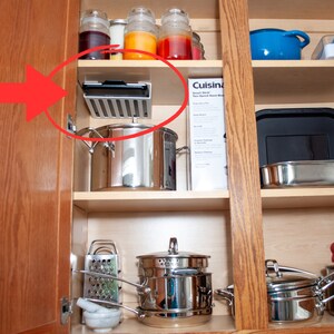 Under cabinet knife storage top