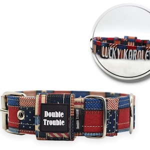May include: A red, white, and blue patterned dog collar with a silver buckle and a black tag that says "Double Trouble". The collar is shown in a close-up view. The text "LUCKY KOROLEVSKI" is visible on the collar in a mirror reflection.