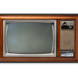 May include: A vintage television set with a wood frame and a black and white screen. The television has a silver control panel with a knob and a speaker grill.