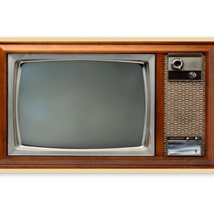 May include: A vintage wooden framed television with a black and white screen and a silver control panel. The television has a brown wood grain finish and a silver metal trim.