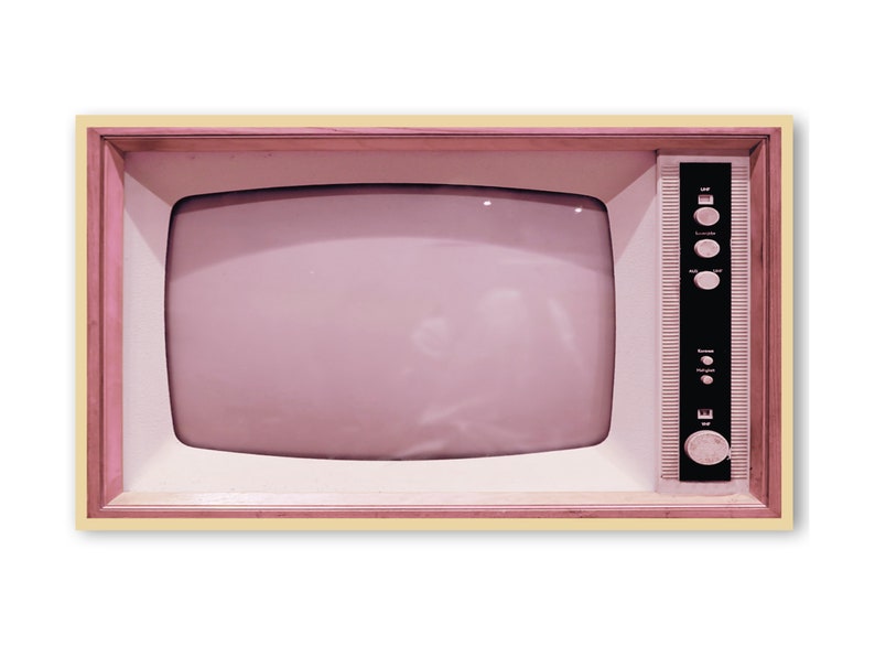 May include: A vintage television set with a pink screen and a wooden frame. The television has a black control panel with knobs and a dial.