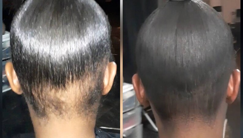 May include: A side view of a person's head with black hair pulled back into a ponytail. The hair is sleek and straight, with a visible part in the middle. The person's neck and shoulders are also visible.