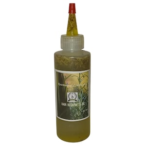 May include: A clear glass bottle with a red and yellow dropper top filled with a yellow liquid and herbs. The bottle label reads "Rosemary & Lemongrass Hair Regrowth Oil".