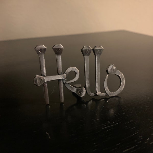 Hello -horseshoe nail word art
