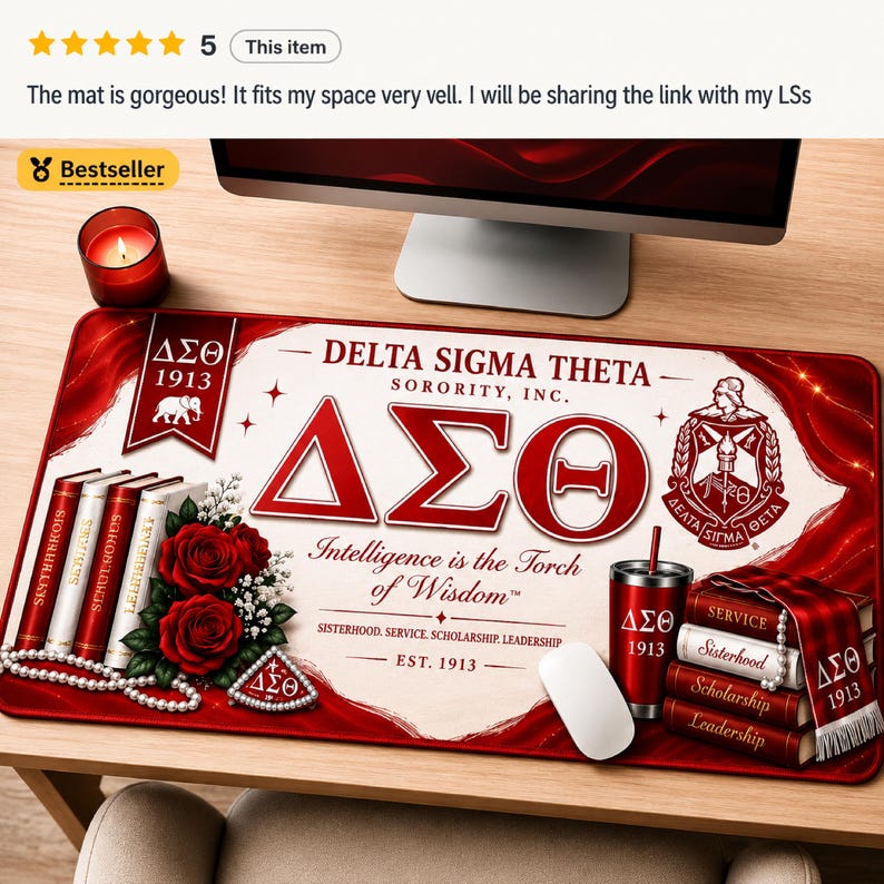 May include: A rectangular desk mat featuring Delta Sigma Theta Sorority branding in red and cream. It displays the Greek letters, the crest, red roses, a stack of books, and the text: Delta Sigma Theta Sorority, Inc., Intelligence is the Torch of Wisdom.