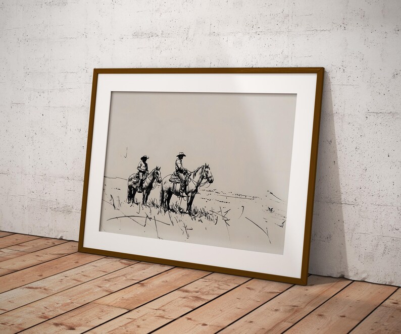 May include: A black and white line drawing of two cowboys riding horses across a field. The drawing is framed in a brown frame.