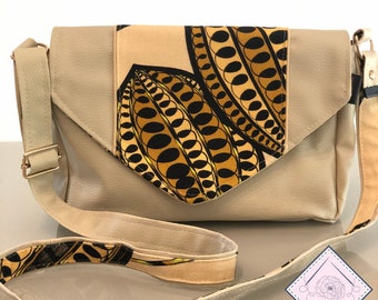 Hibiscus handbag, with its yellow and black adjustable strap