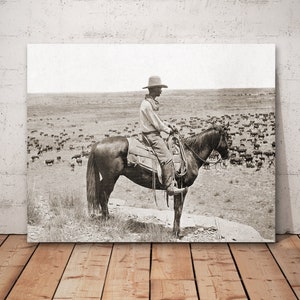 Texas cowboy photo, day herder on a knoll overlooking the grazing herd. LS Ranch, Texas, vintage cowboy wall art decor.