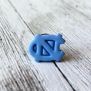 Unc jibbitz hot sale