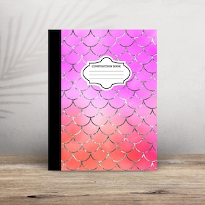 May include: A pink and orange composition book with a silver mermaid scale pattern. The book has a black spine and a white label that says "COMPOSITION BOOK".