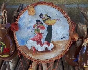 Vintage childs tambourine and Spanish hand painted castanets, children's toys.