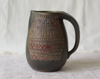 Clay jug in ethnic pattern | dark gray vintage vase