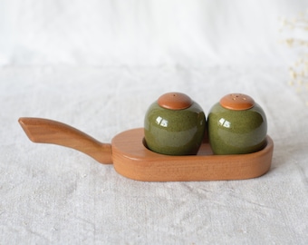 Salt and pepper shakers on a teak wood stand  |  Gantofta Sweden green ceramic