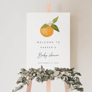 Un pequeño letrero de bienvenida para baby shower de Cutie, letrero de bienvenida para baby shower de color naranja, baby shower floral, baby shower de azahar | AYUNARSE