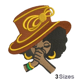 May include: An embroidered design featuring a woman wearing a brown hat with gold accents and a gold bow. The woman has black hair, gold earrings, and is wearing a green and yellow bracelet. The image includes the text "3 Sizes".