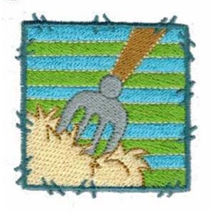 May include: Embroidered patch featuring a gardening scene. A gray pitchfork is shown over a pile of hay, set against a backdrop of blue and green horizontal stripes. The patch has a blue border with frayed edges.