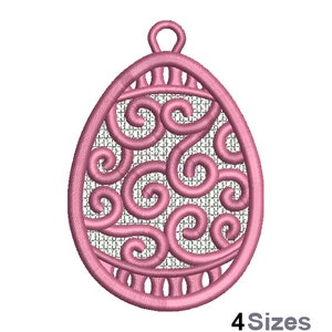 May include: Pink embroidered Easter egg design with a swirl pattern.  The design is in the shape of an egg with a loop at the top for hanging.