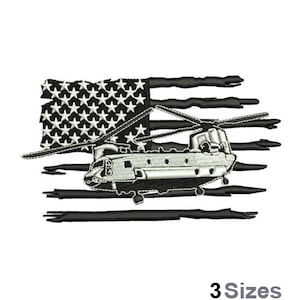 May include: A black and white embroidered patch of a Chinook helicopter flying over a distressed American flag. The helicopter is white and the flag is black.