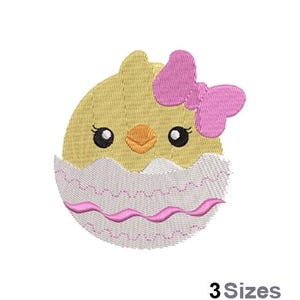 May include: Embroidered design of a yellow chick with pink bow, peeking out of a white egg with pink accents.