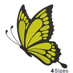May include: A yellow butterfly with black outlines and intricate wing patterns. The butterfly is in flight with its wings spread wide.